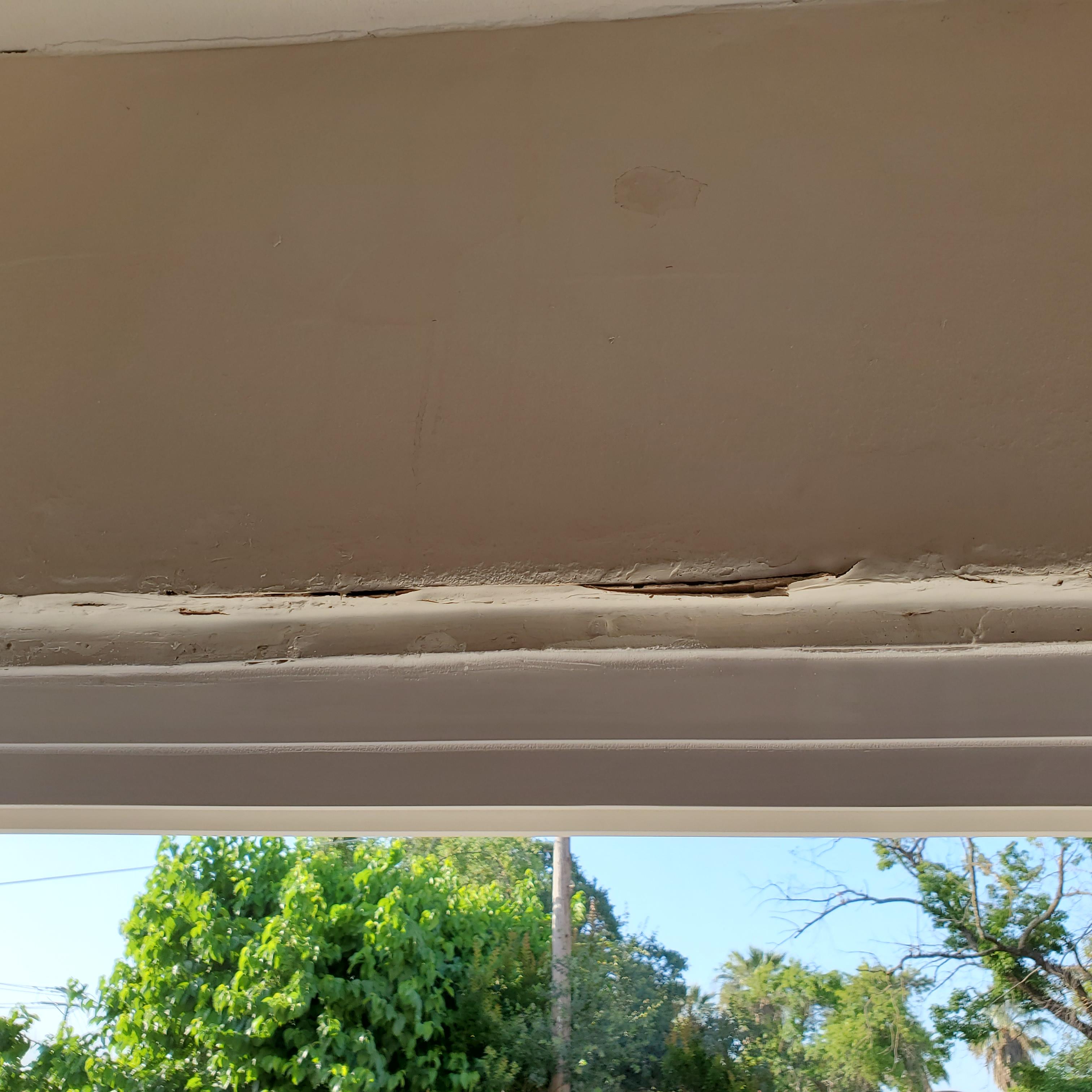 Evidence of past leaks (present?) around window.