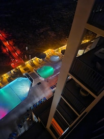 Night view of the pool from the balcony