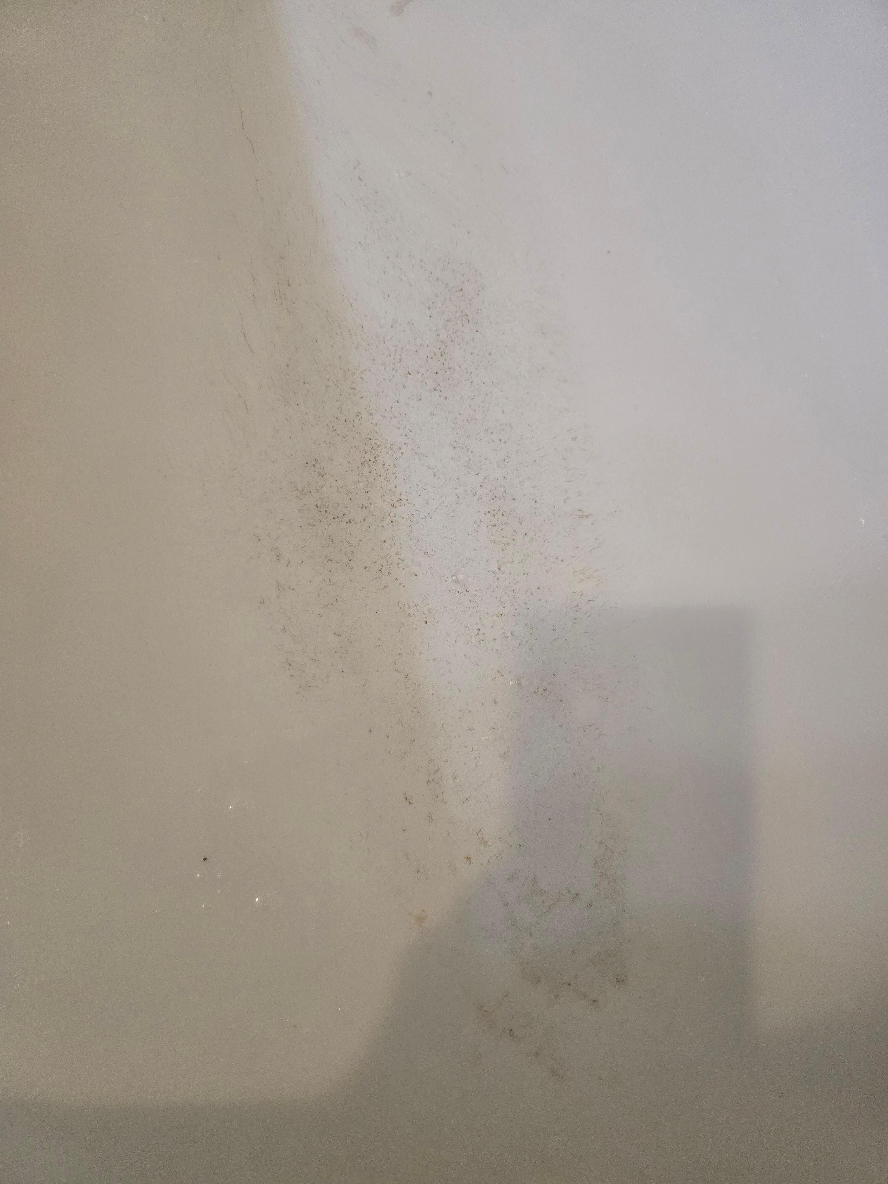 Bottom of tub from leaky faucet