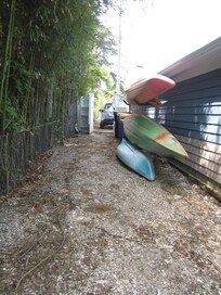 Kayaks available for use on the pond.