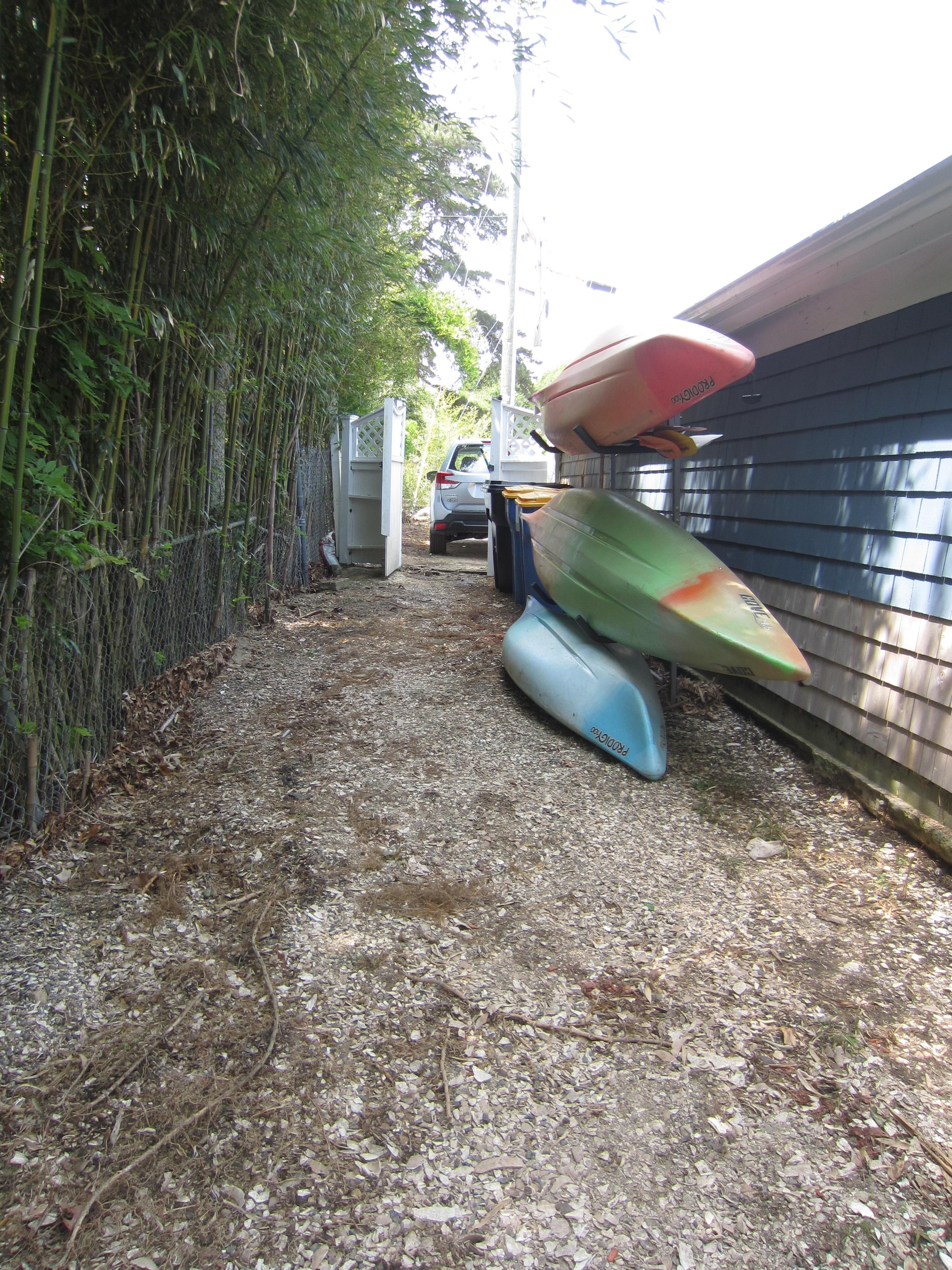 Kayaks available for use on the pond.