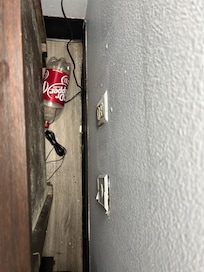 Floor was not swept. This was behind nightstand.
