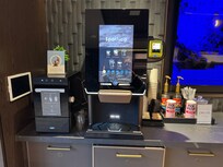 Coffee bar. Free from 6-9 every morning. Vanilla latte is very good. Can use credit card to purchase outside the free hours. Nice “perk”