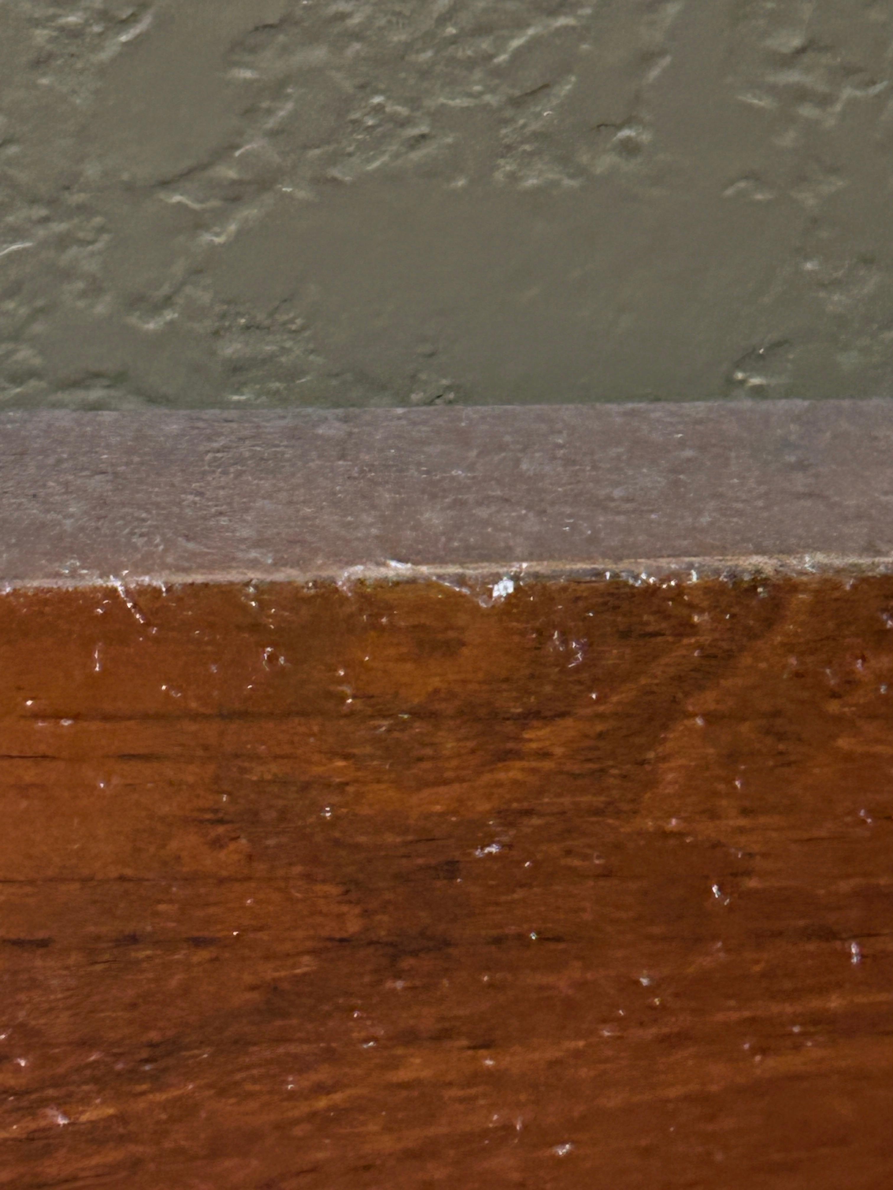 That is the layer of dust on the headboard completely white with dust