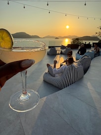 Sunset at the Rooftop Bar with a drink in hand