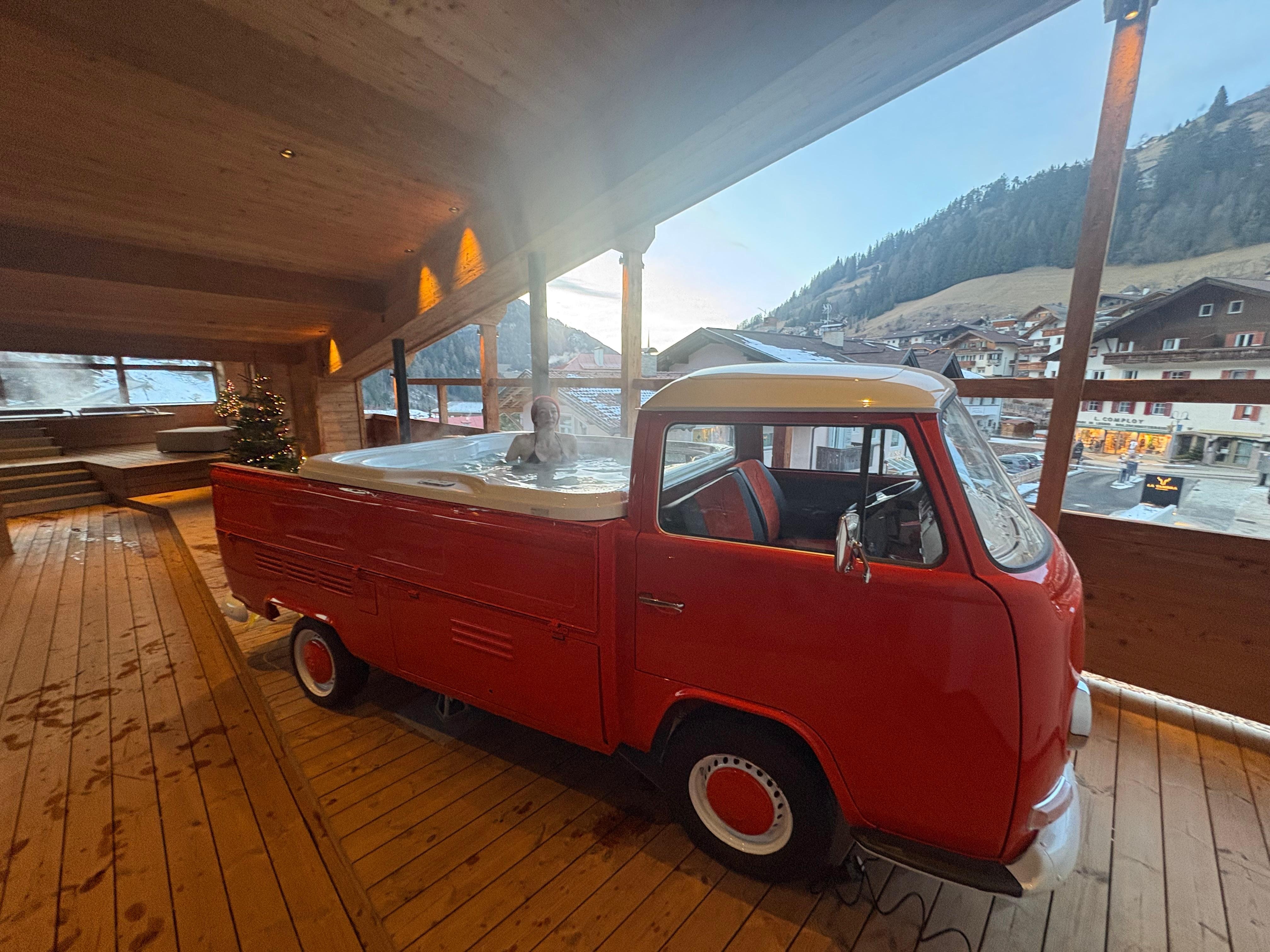 Fun jacuzzi in an old VW van on the rooftop. One of two jacuzzis.