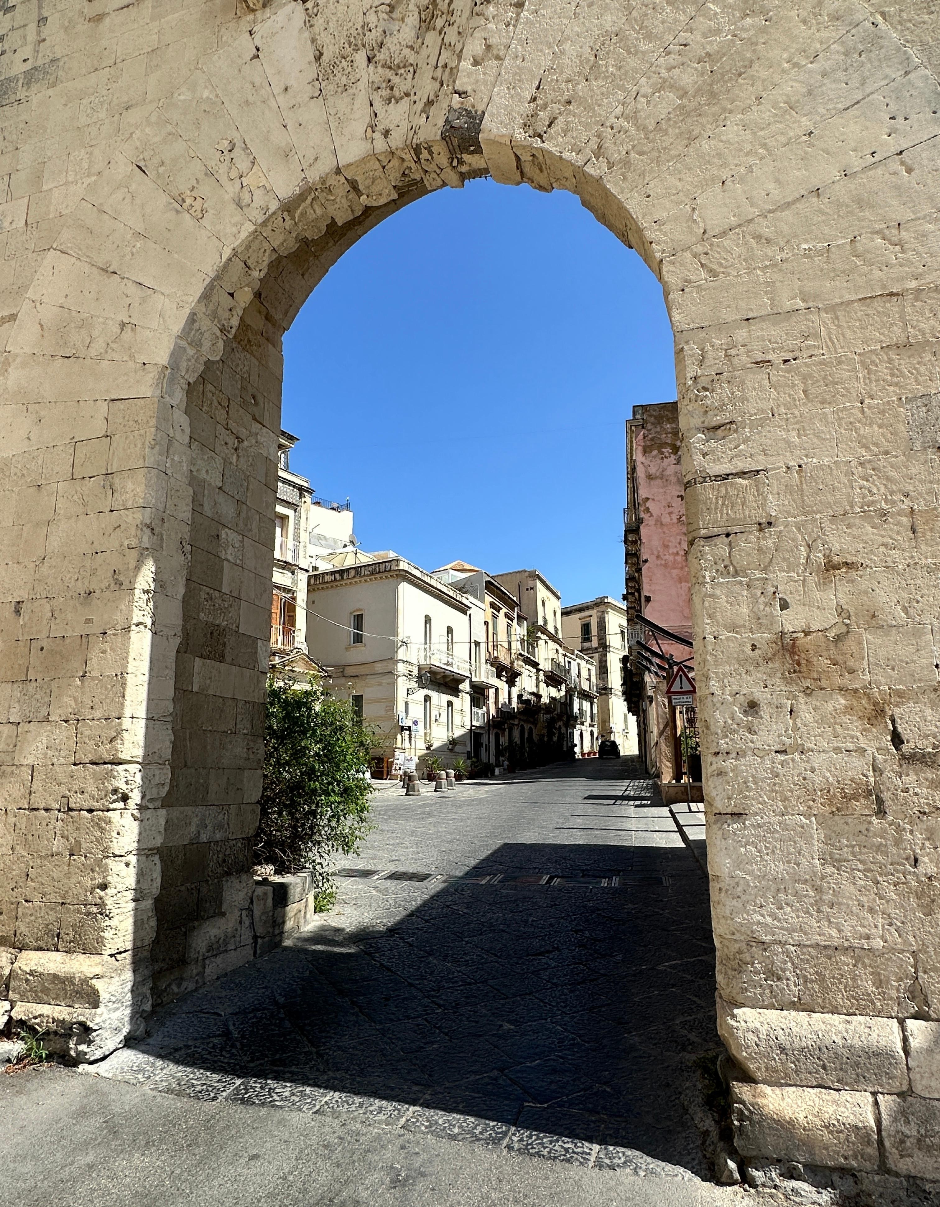 View of the B+B through the gate entering the old town of Ortigia 