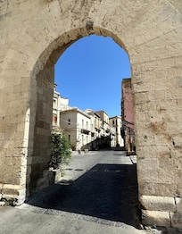 View of the B+B through the gate entering the old town of Ortigia