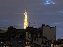 View from room balcony of Eiffel at night