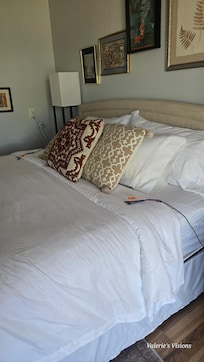 Comfortable bed, side tables with lights  plenty of plugs