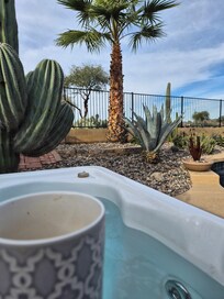 Morning coffee in the hot tub.