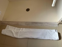 No water stopper. Went through several towels after each family member showered.