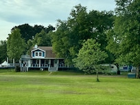 The house that the camper is next to.