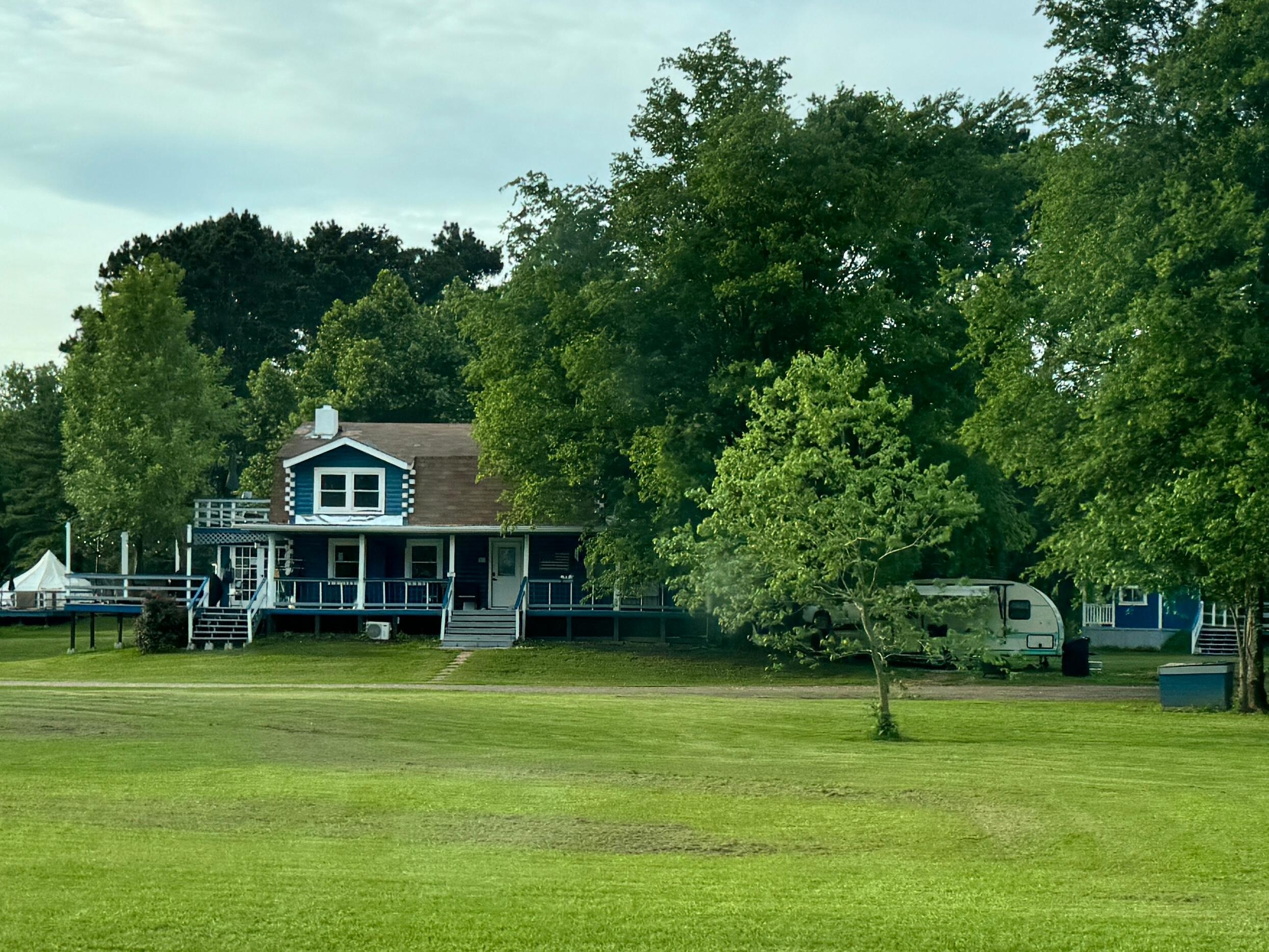 The house that the camper is next to.
