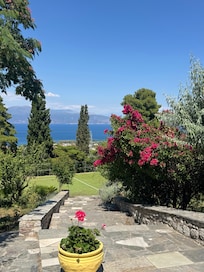 The gardens and a view of the gulf and  Selianitika