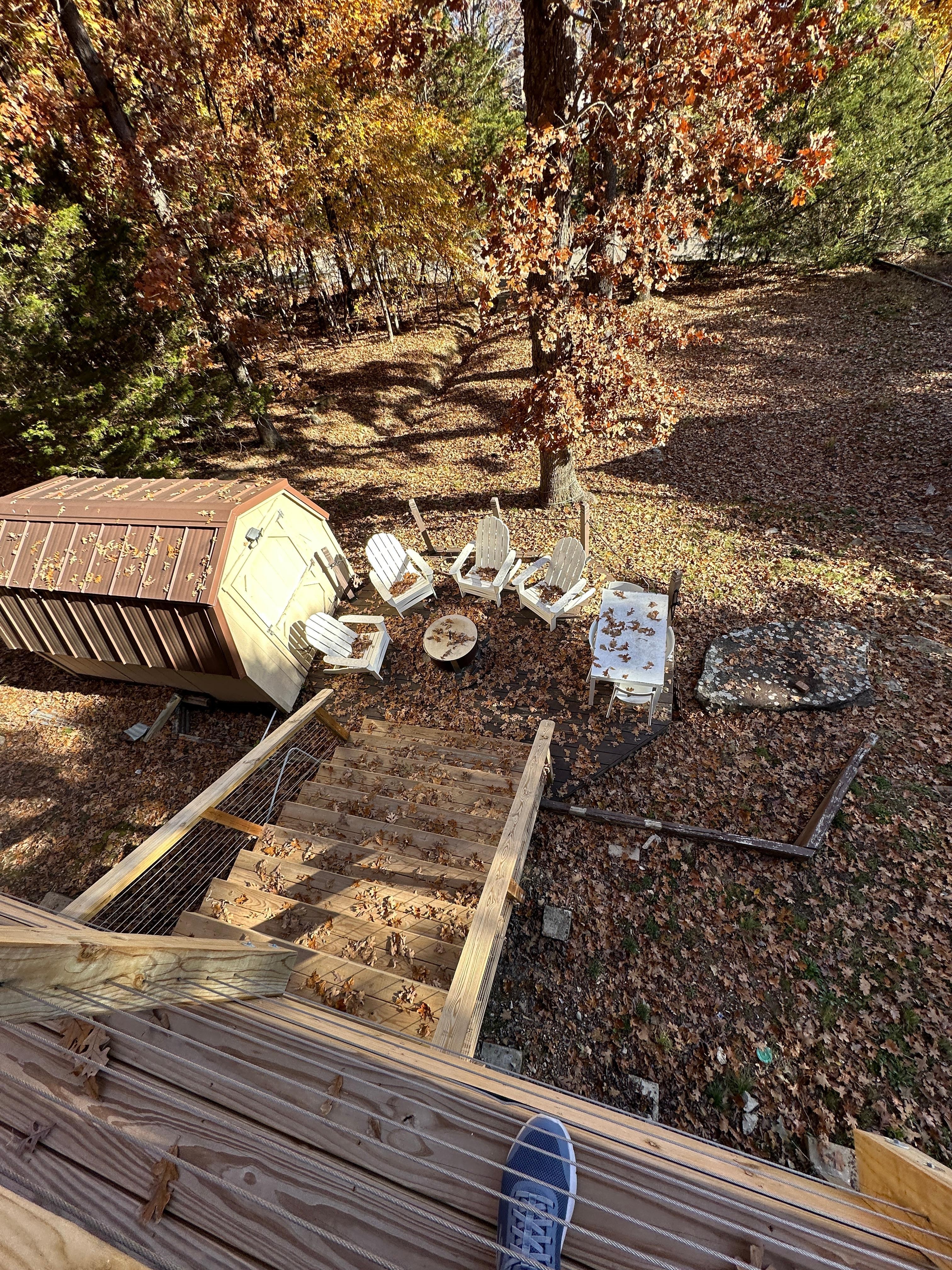 Looking down from the deck. Chairs could use pressure washing. 