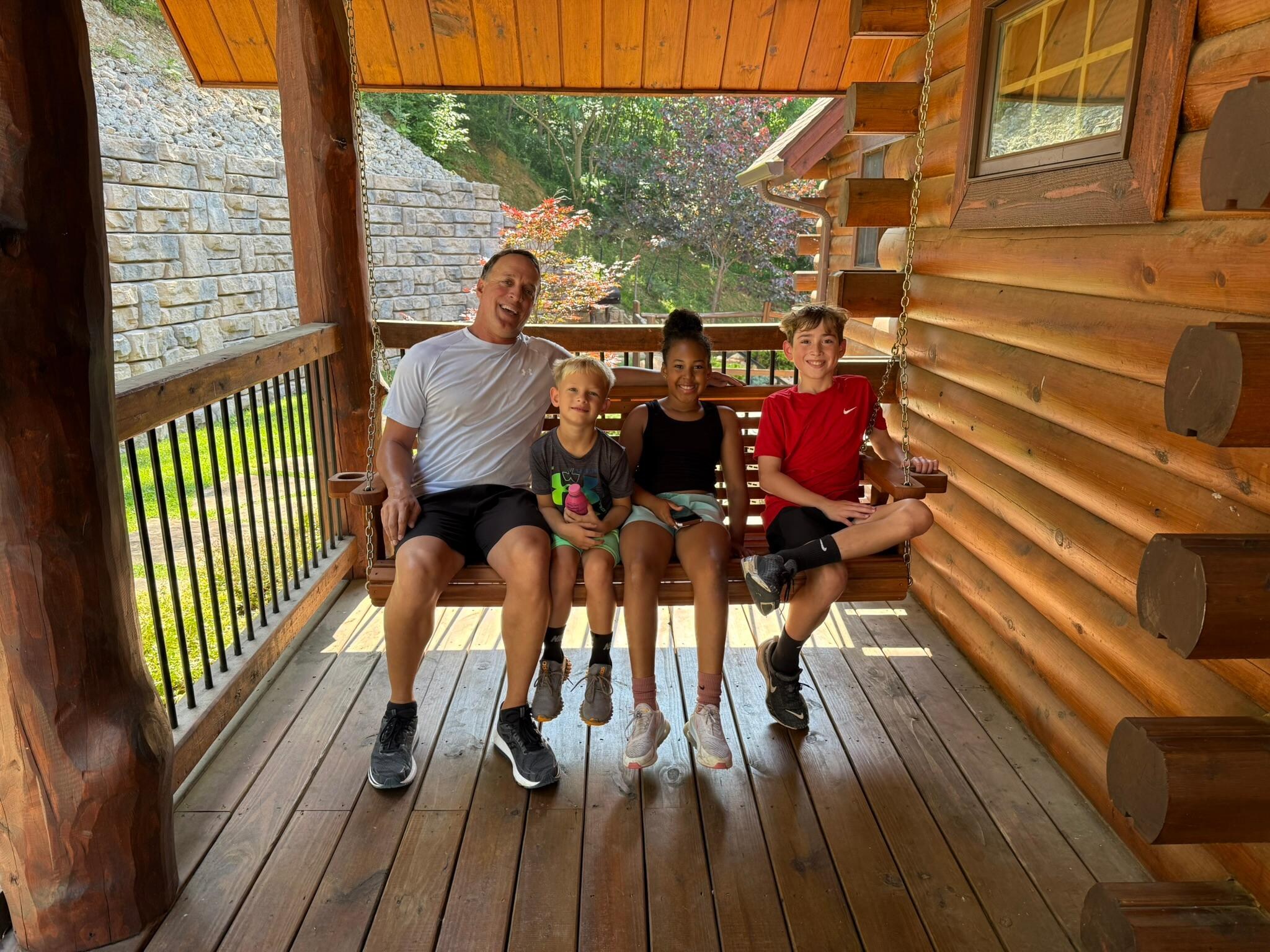 Enjoying a cool down time after doing a morning workout on the driveway.