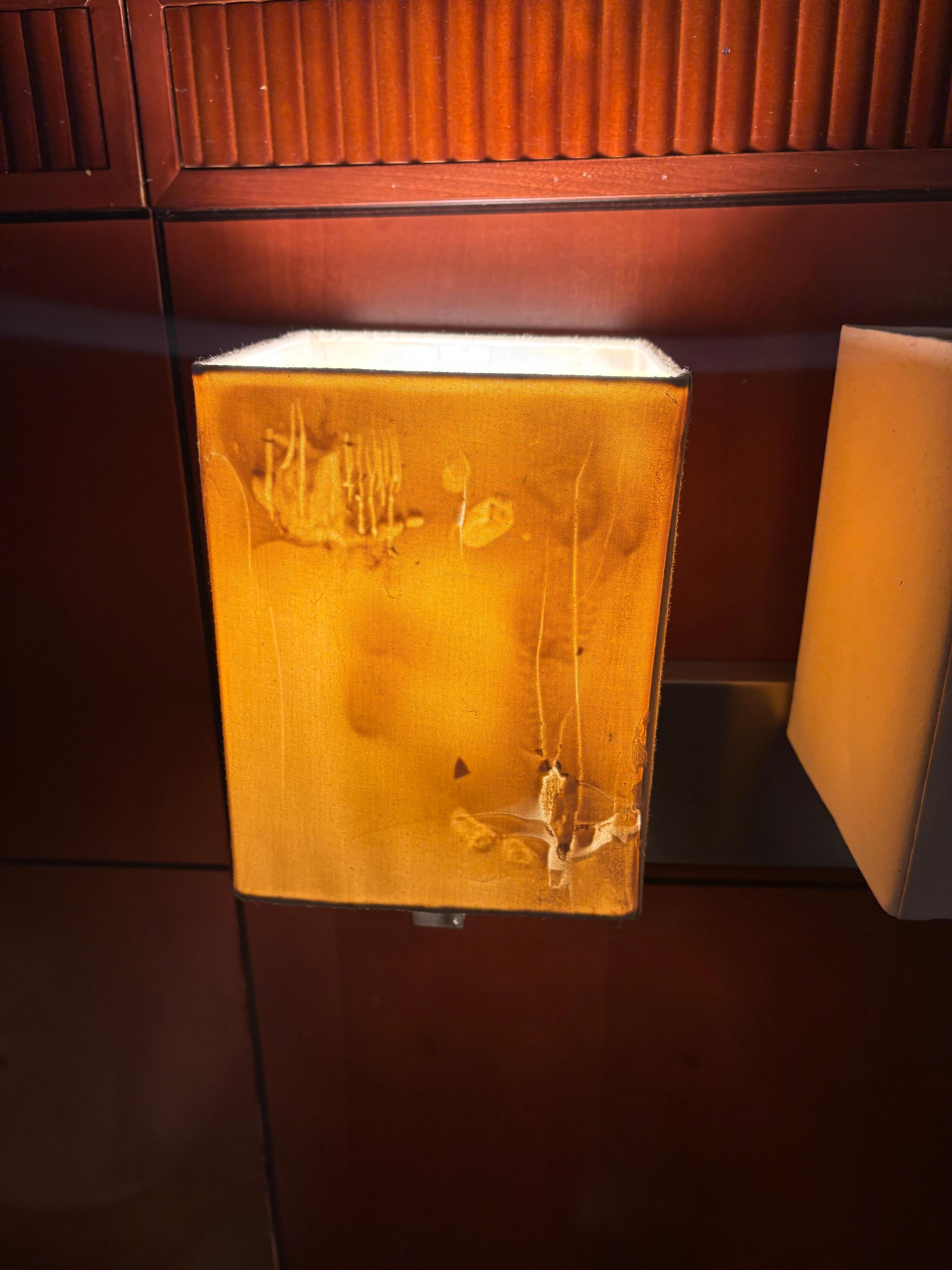 Lampshade next to bed. 