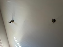 One of the 3 broken towel racks