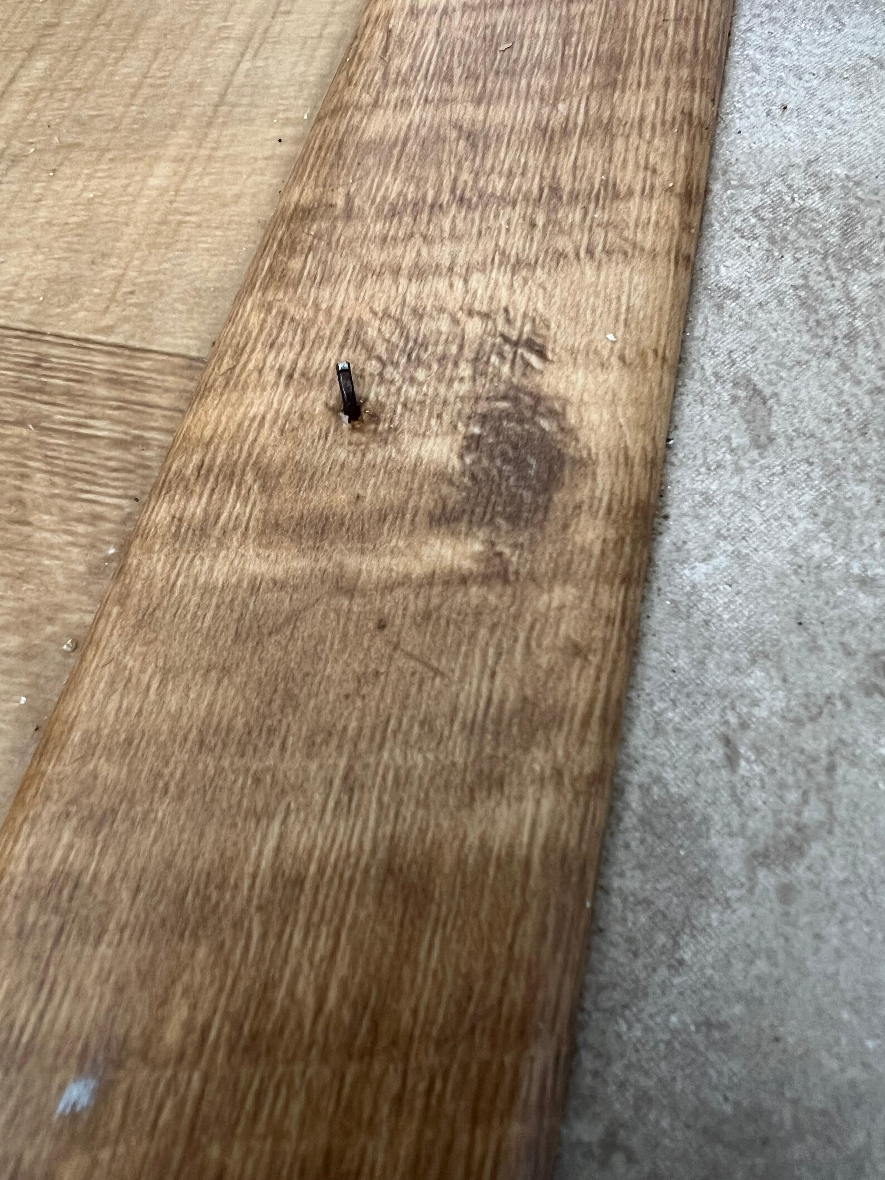 The nail head my husband found with his bare foot while getting into hot tub 