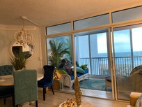 Beachfront glassed-in balcony is wonderful!