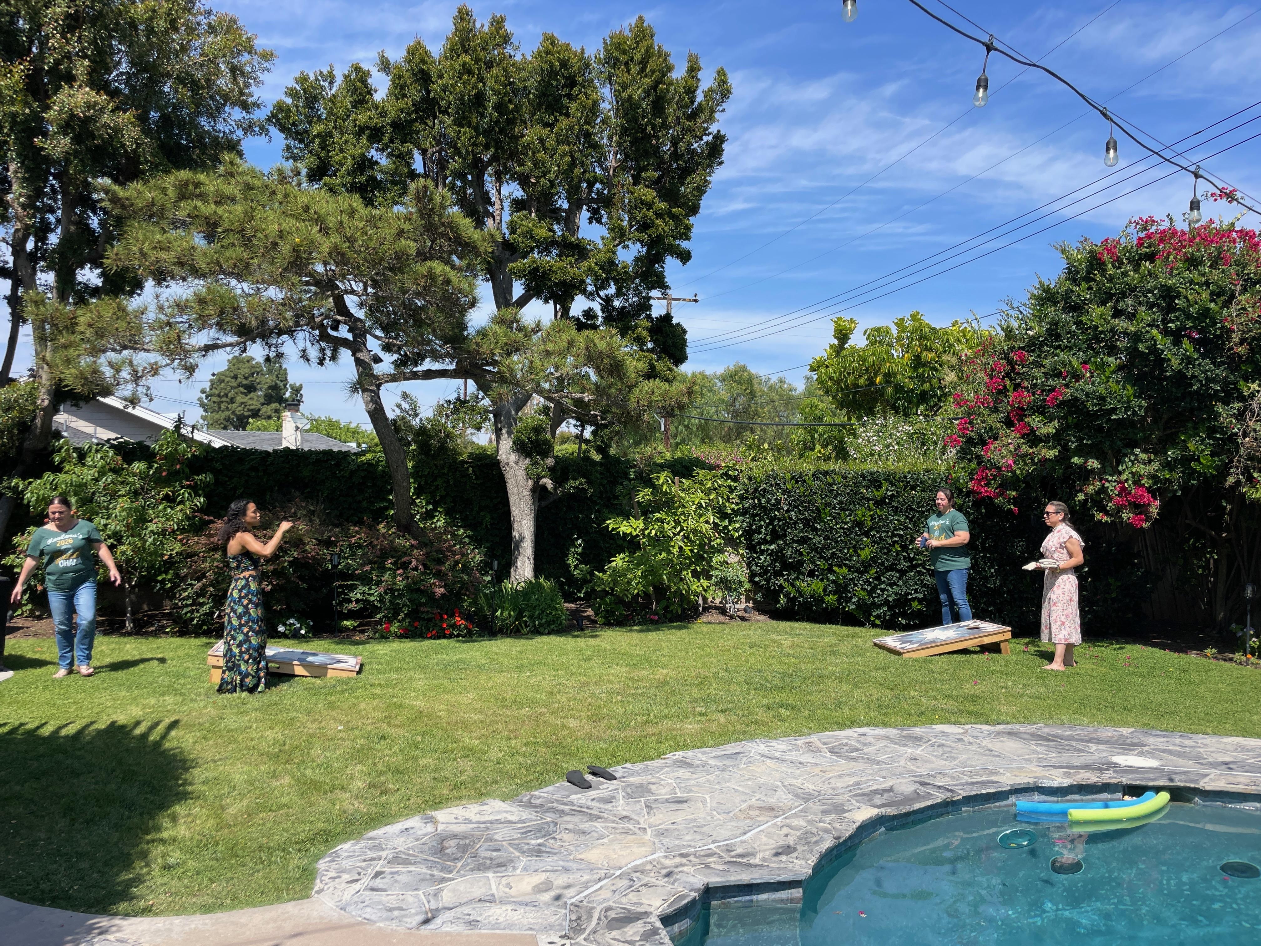 Playing corn hole☺️