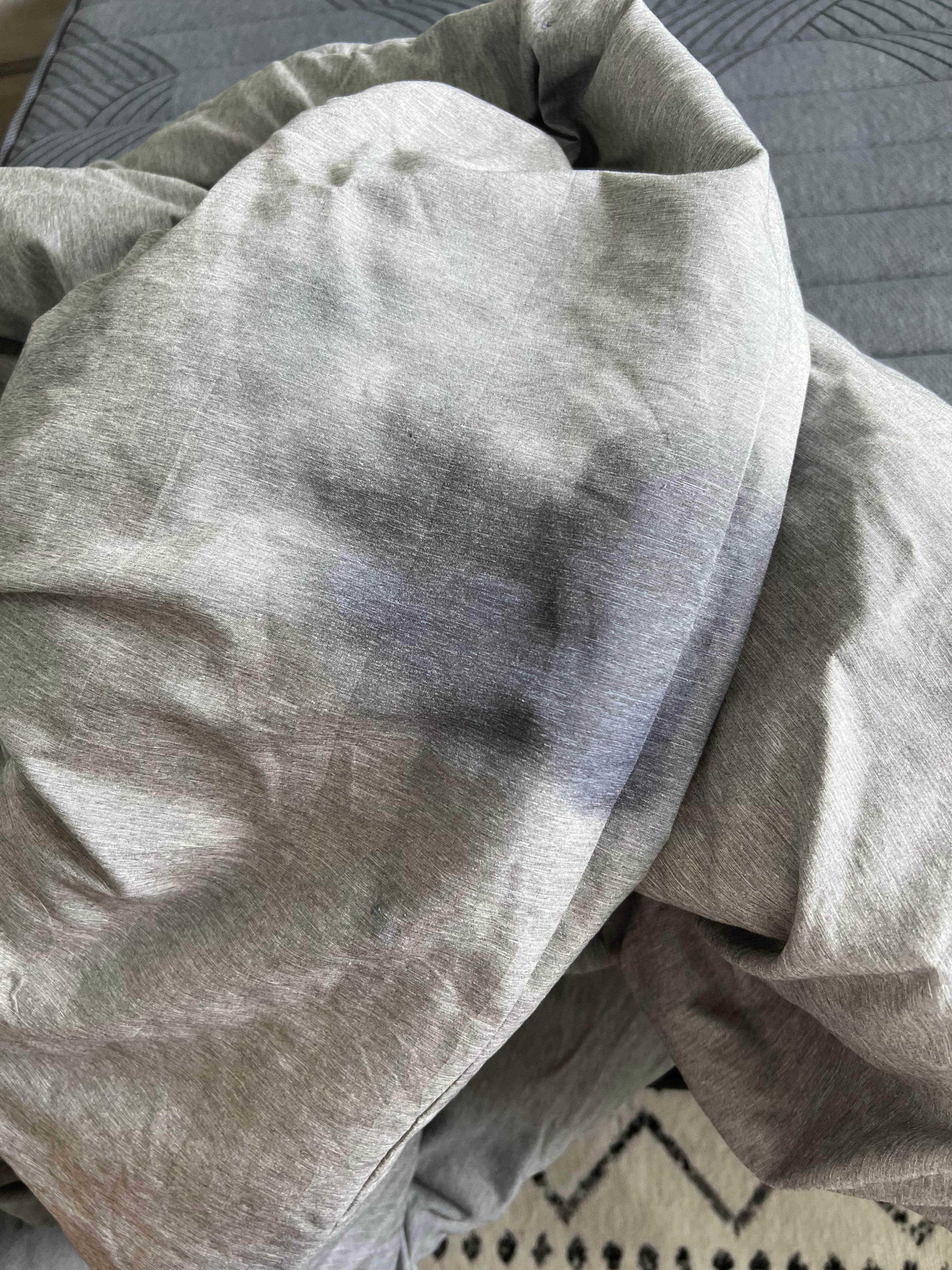 Sticky, wet mark on the comforter 