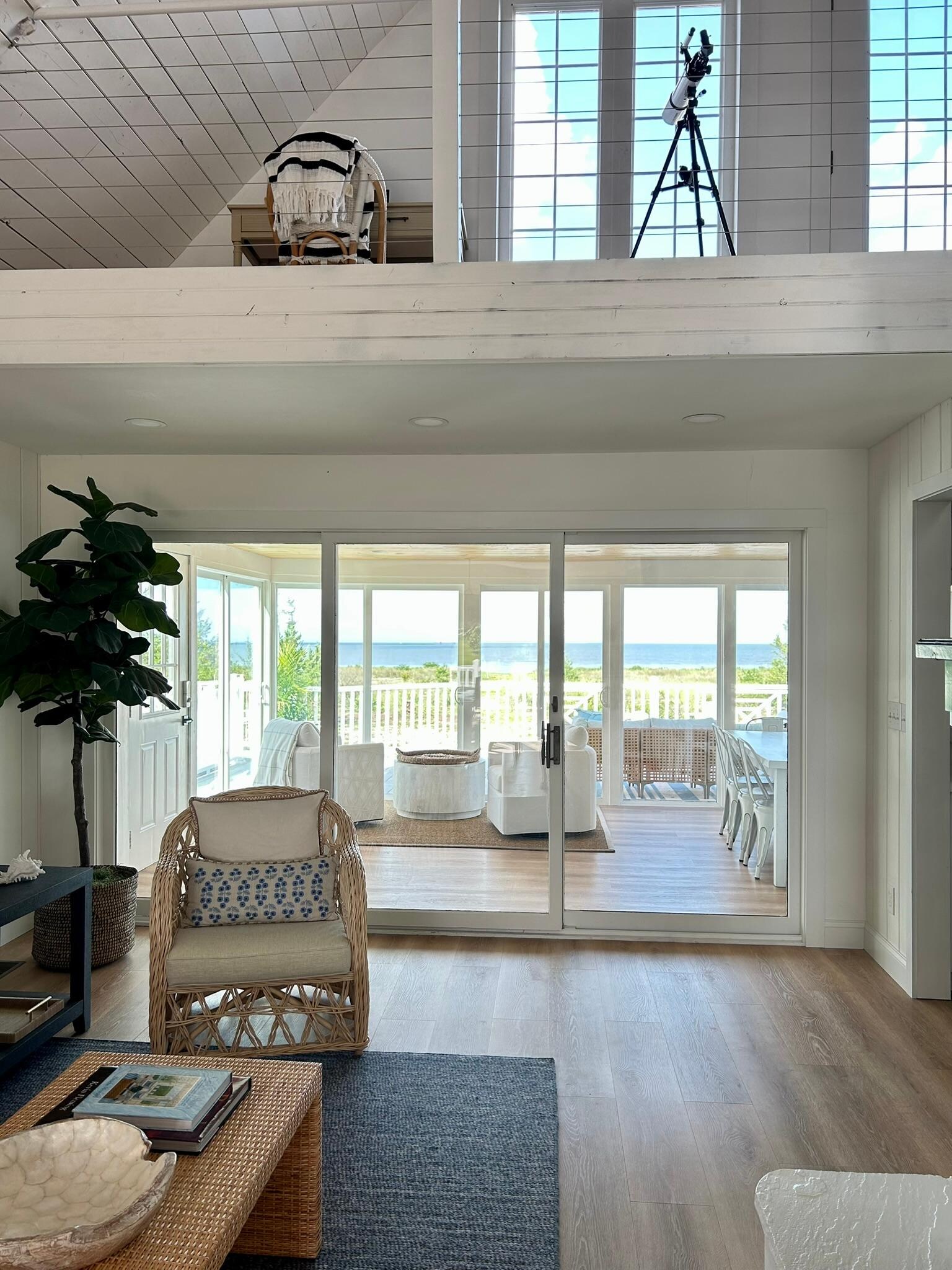 view from family room, thru the sunporch to the water beyond