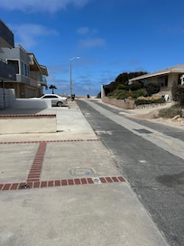 From the driveway- so close to the beach!