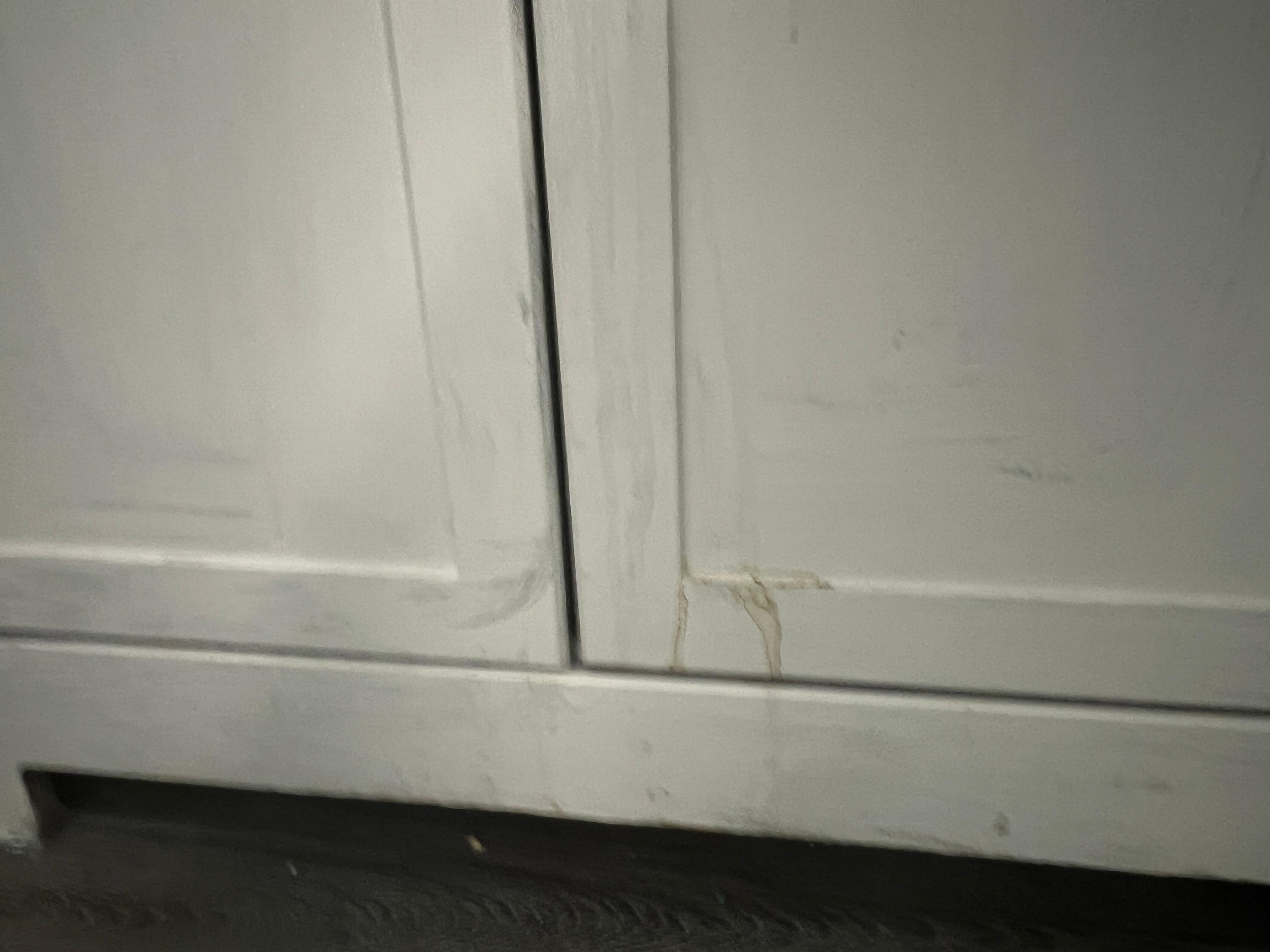 Unknown substance on cabinet