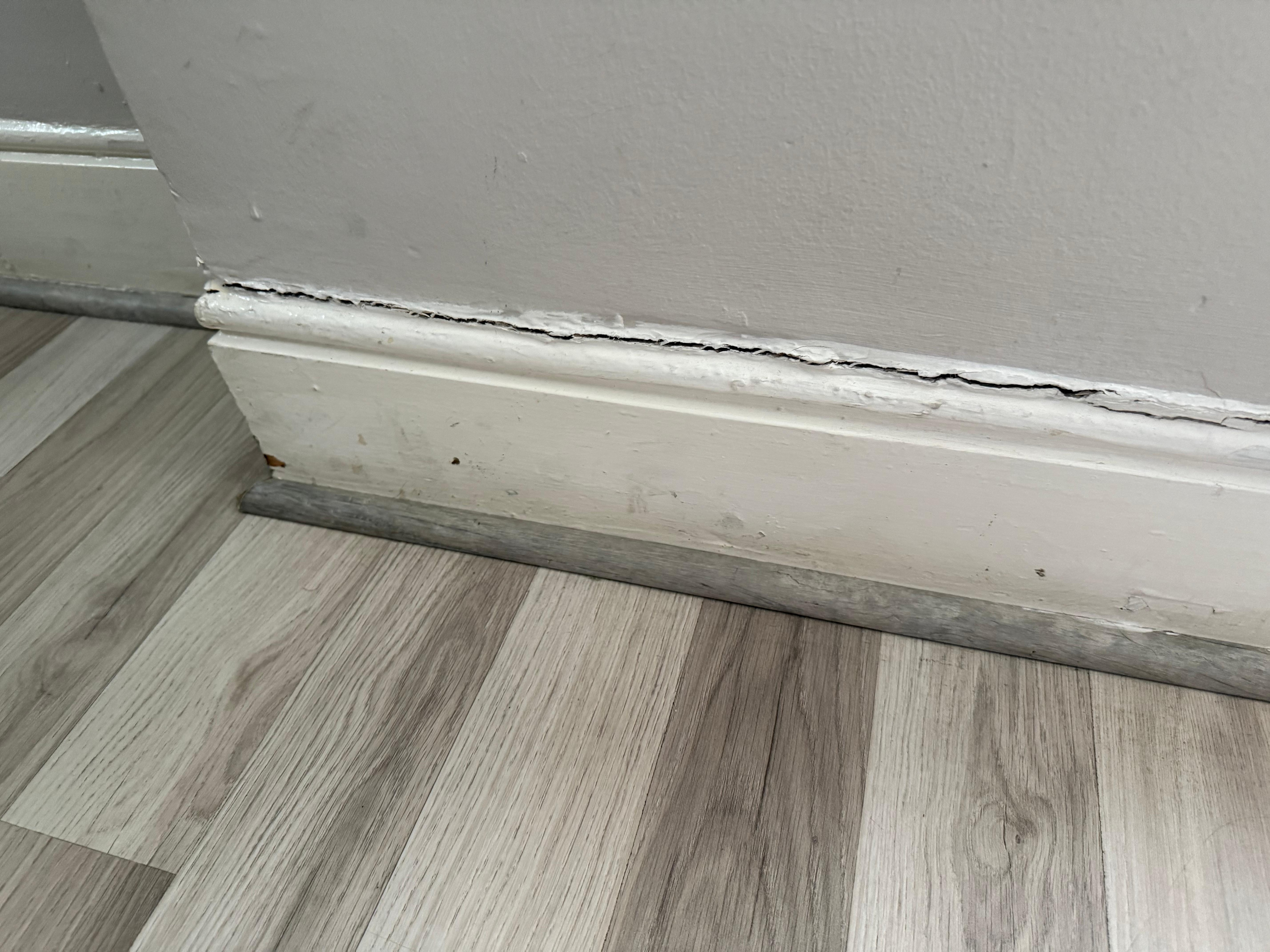 One example of walls that need paint and crack repairs 