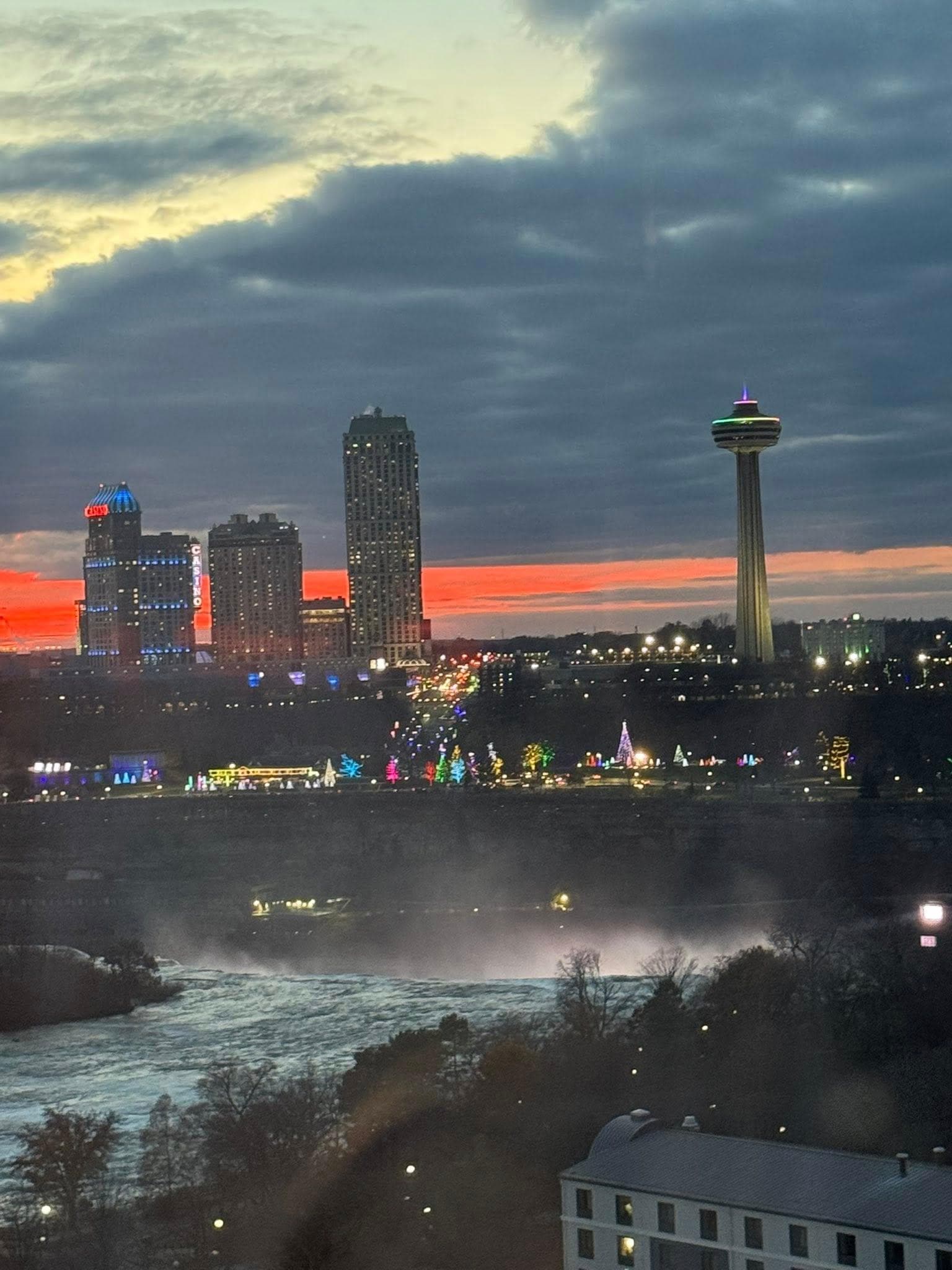 Sunset with the rapids heading to the falls. 