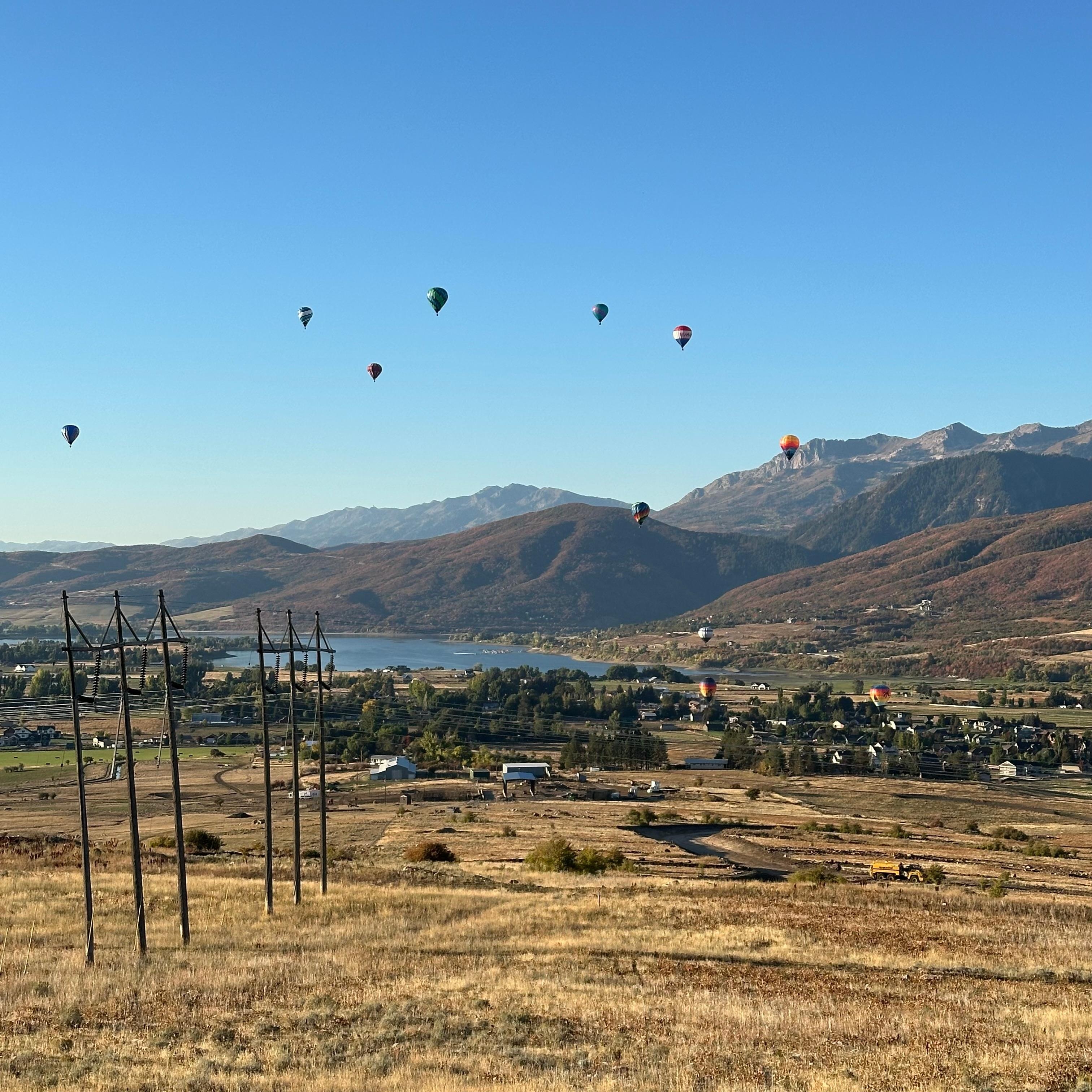 Balloons rising across the valley as seen from the deck!