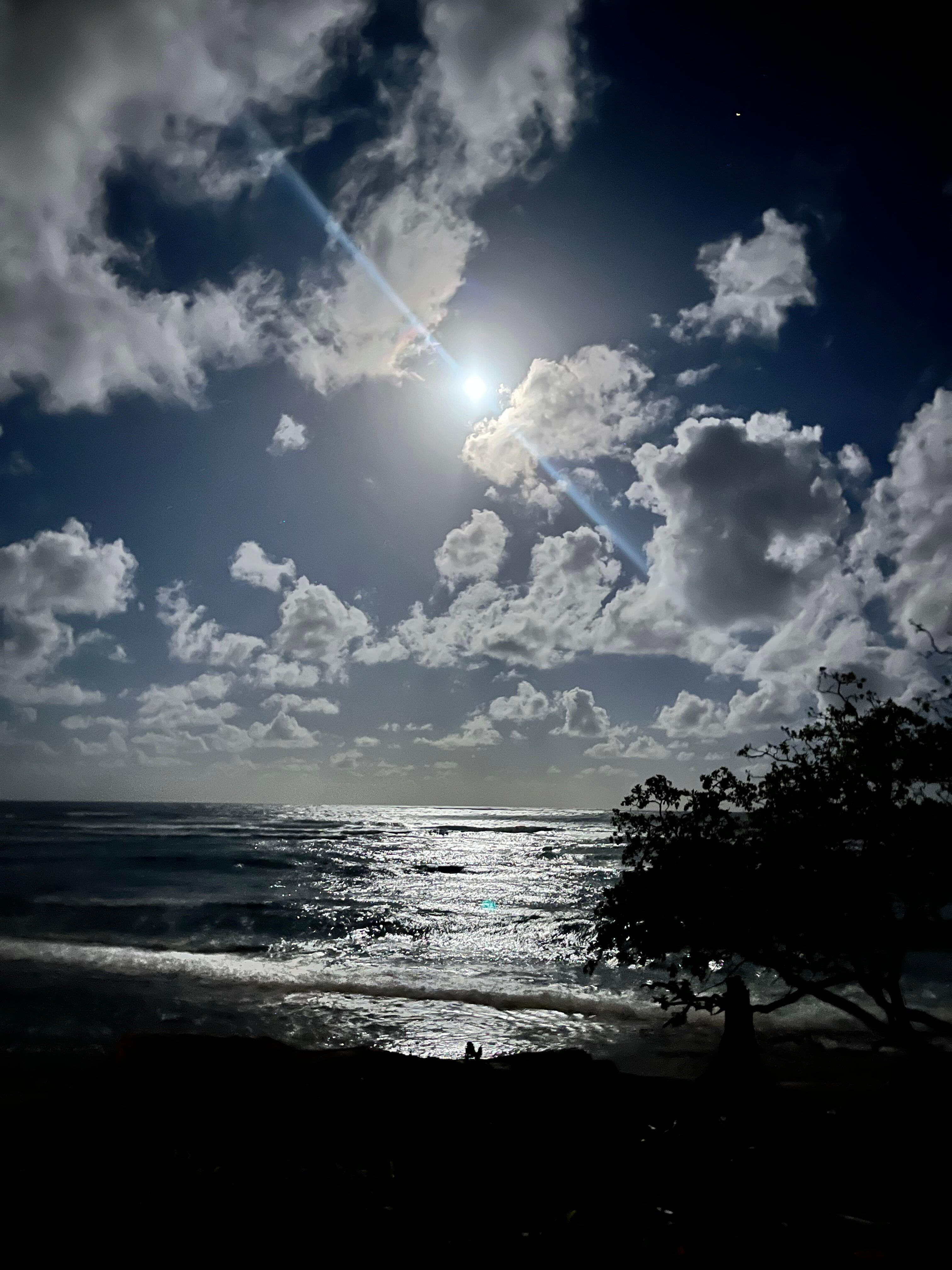 Full moon over the ocean from the front of condo