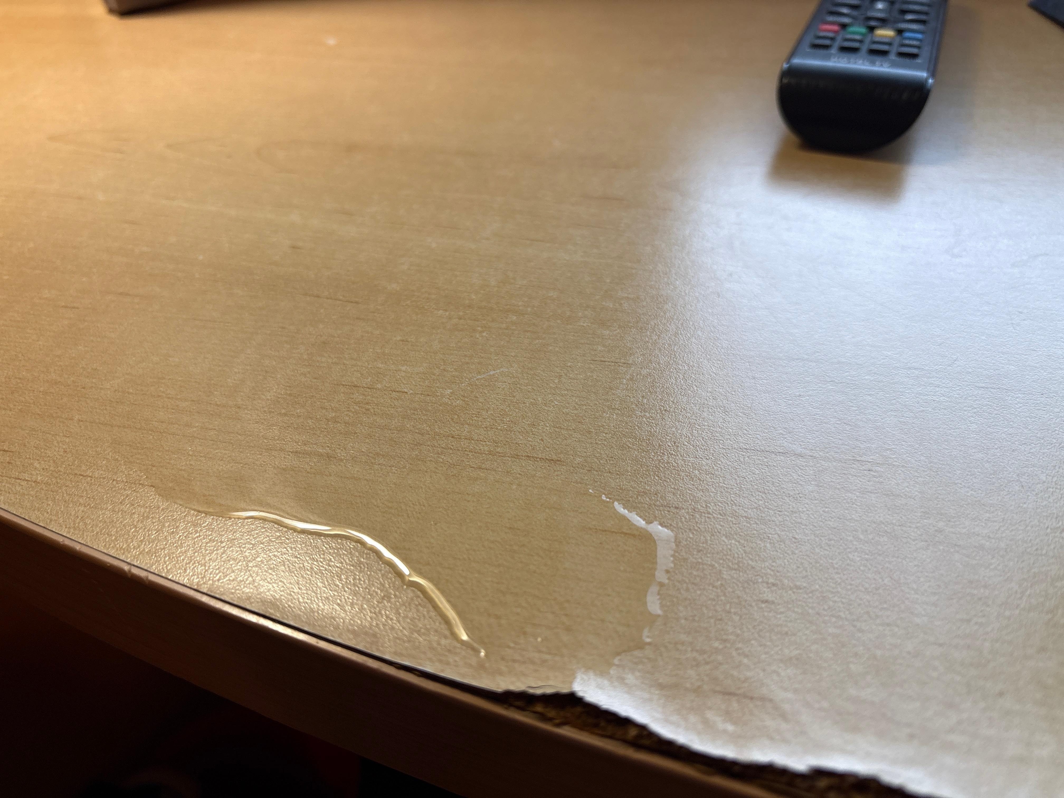 Water leaked through window onto desk
