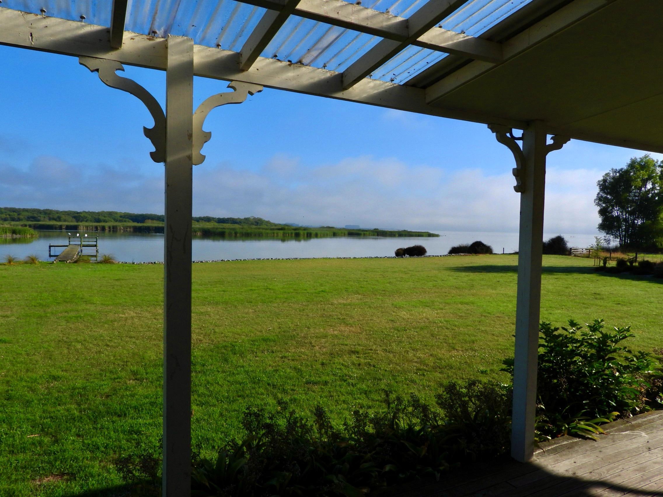 A full verandah circles this house - on a calm and calm day, this is the view from several really comfy outdoor seats!