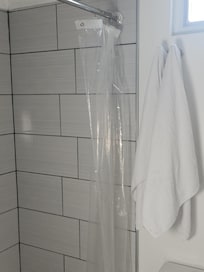 Broken clear shower curtain