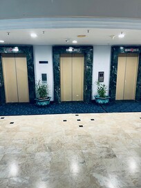 Elevators are slow when busy