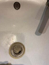 Hand basin, broken plug and the waste leaked straight onto the bathroom floor.