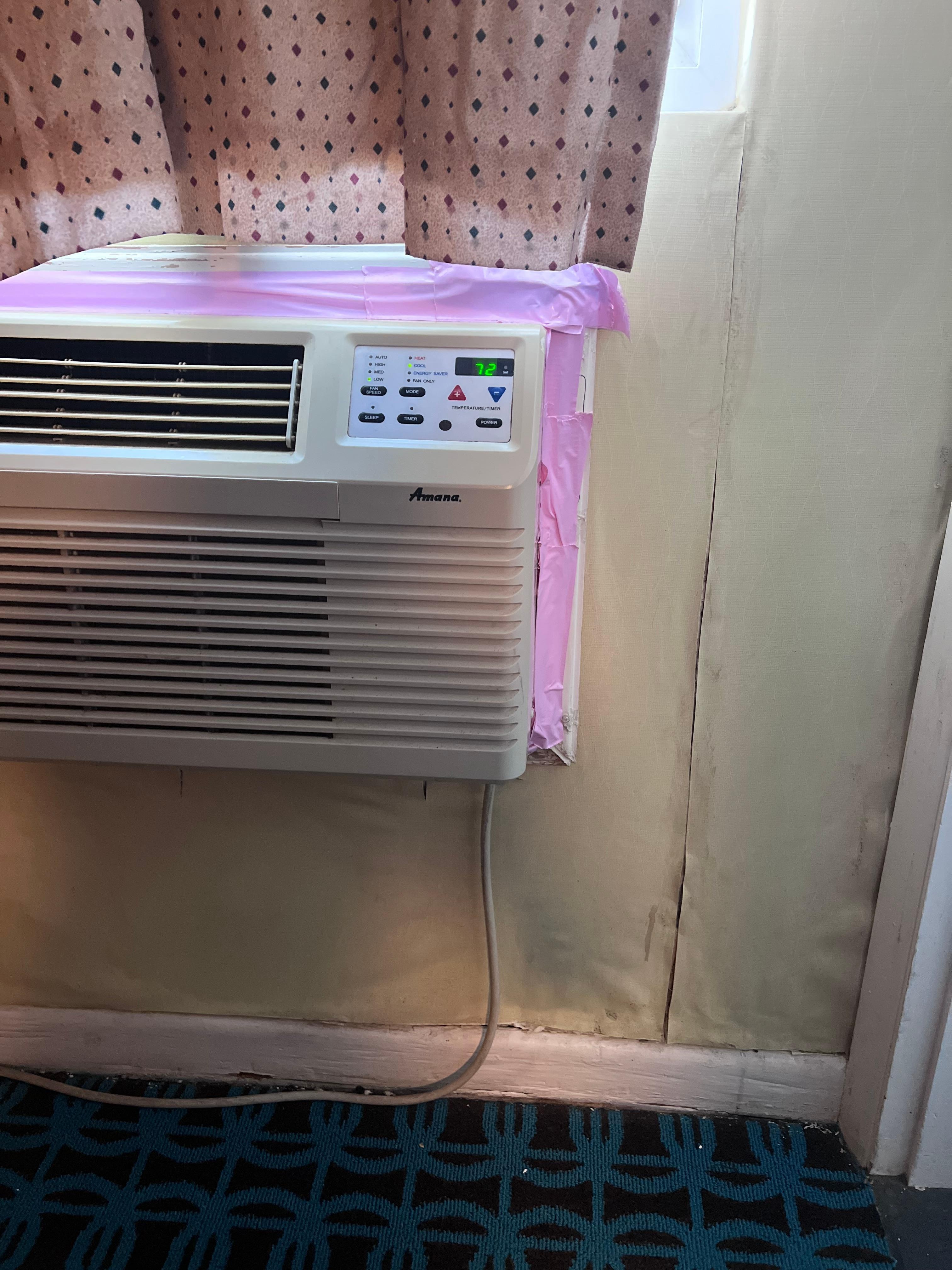 A/C held in with duct tape (let alone the wall coming apart) 