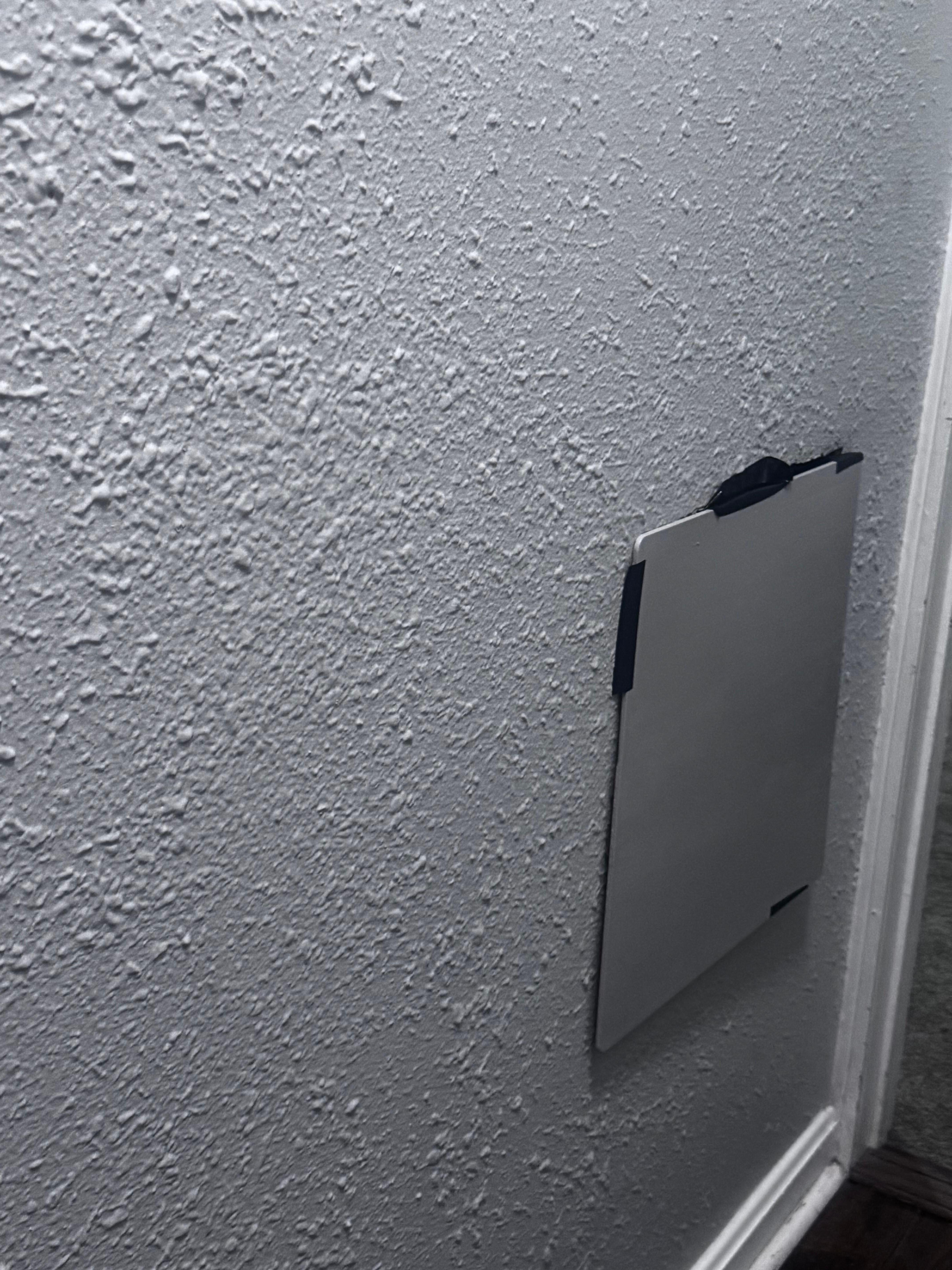 This is a panel that is induct taped to the wall that when I arrived was actually on the floor