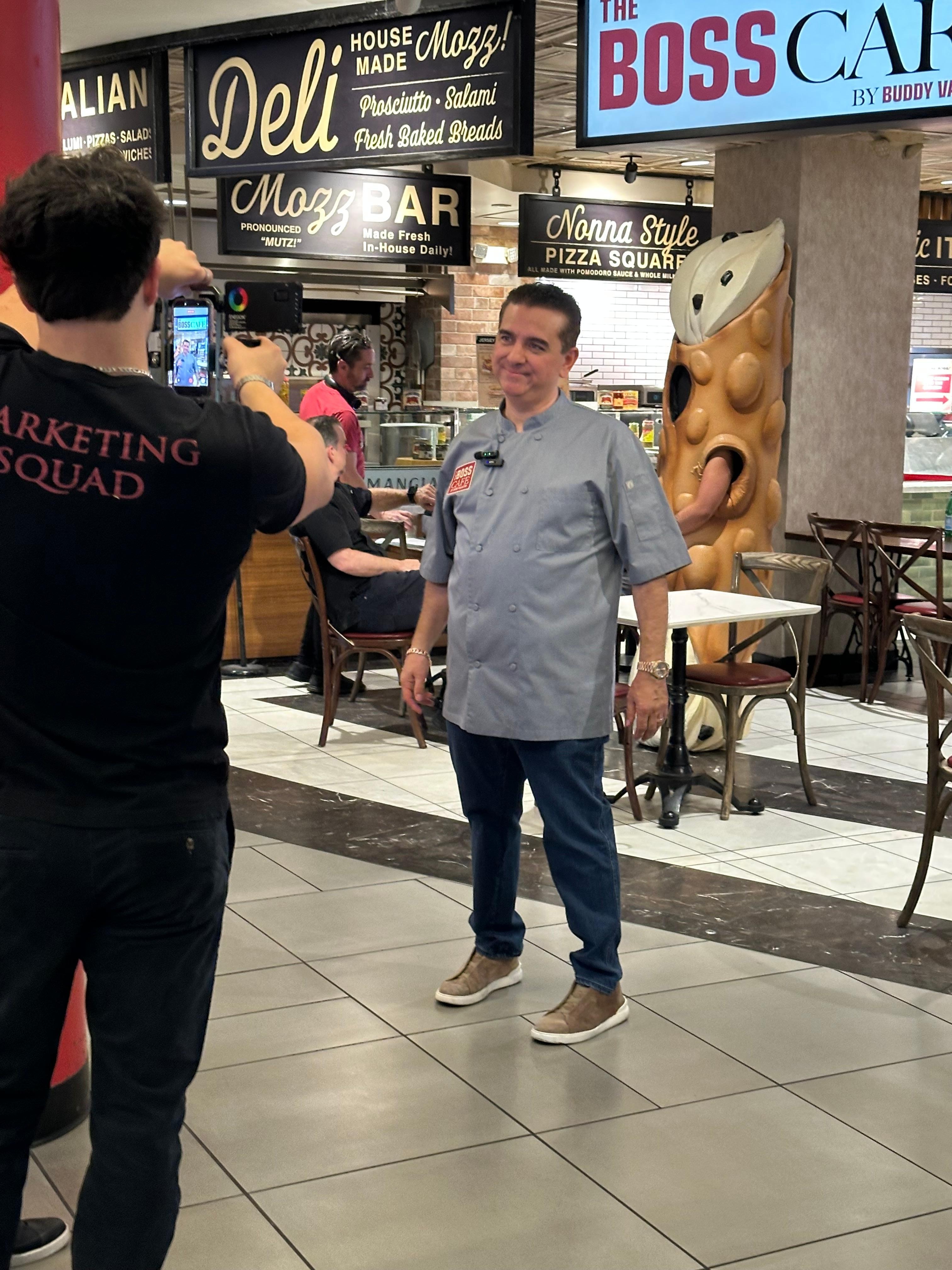 Buddy V in front of Boss Cafe