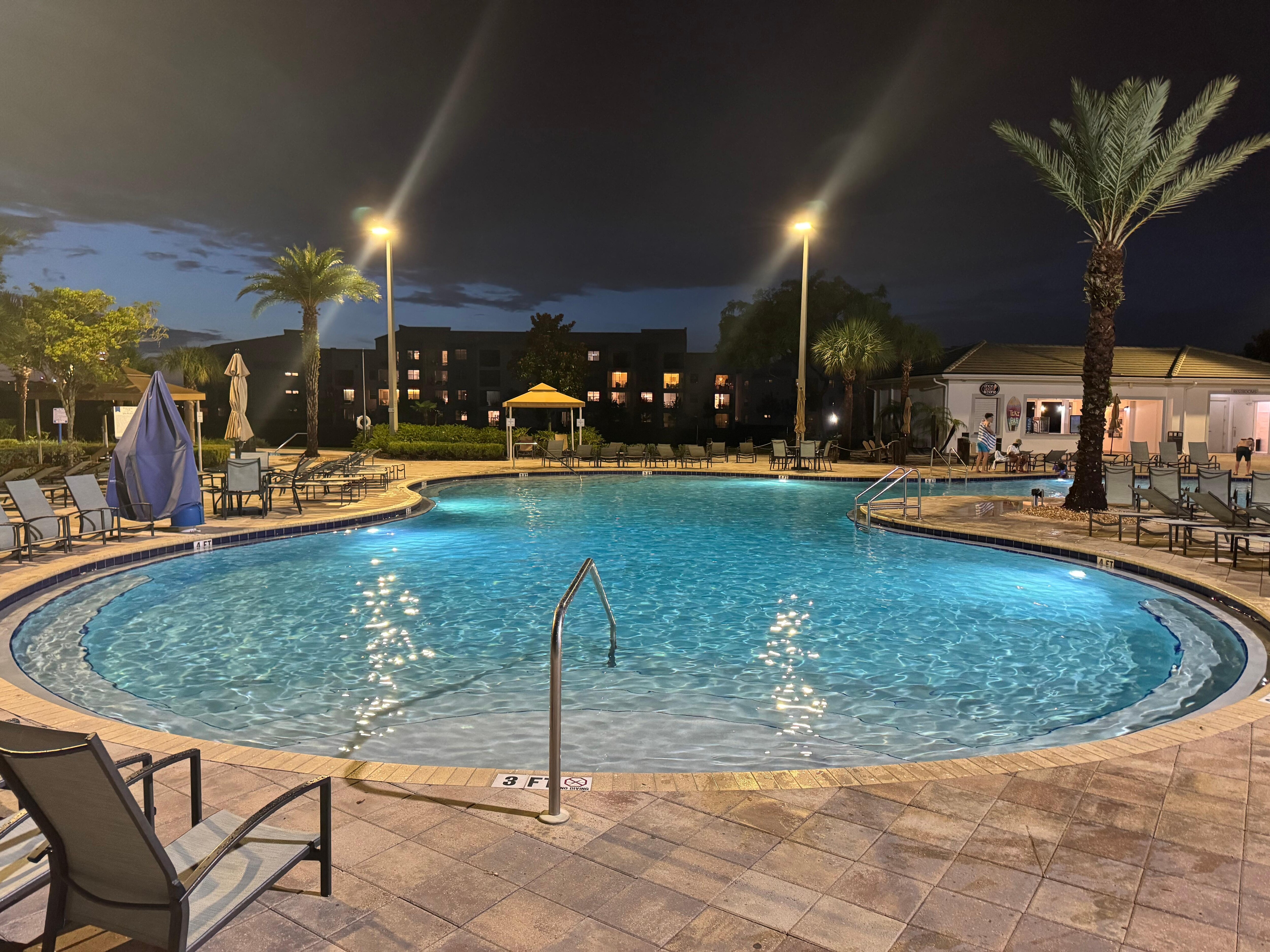 Community pool at night 
