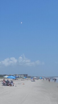 Caught a rocket launch right from the beach—such an incredible sight!