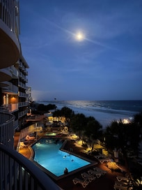 Nighttime view of the pool area