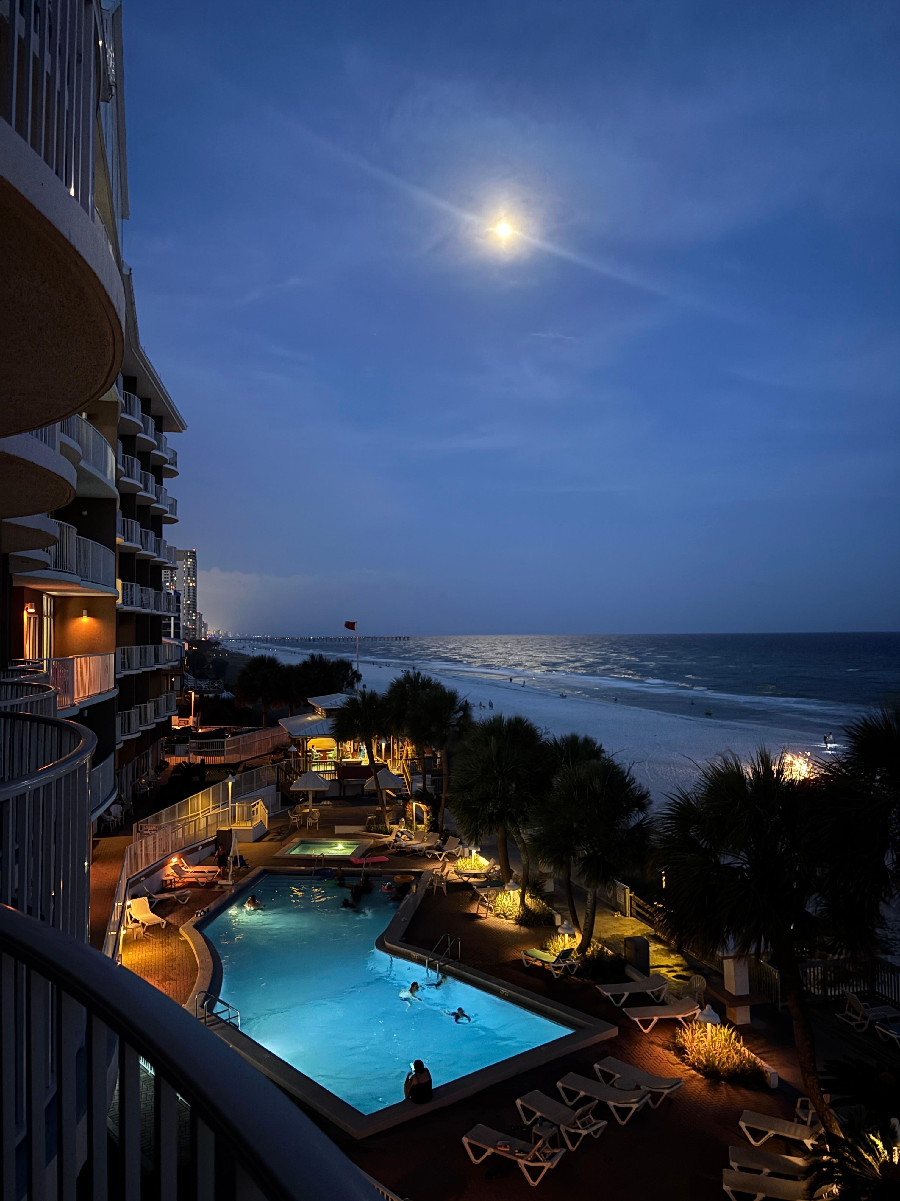 Nighttime view of the pool area