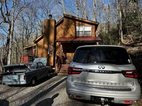 Driveway is gravel and narrower than it appears in photos