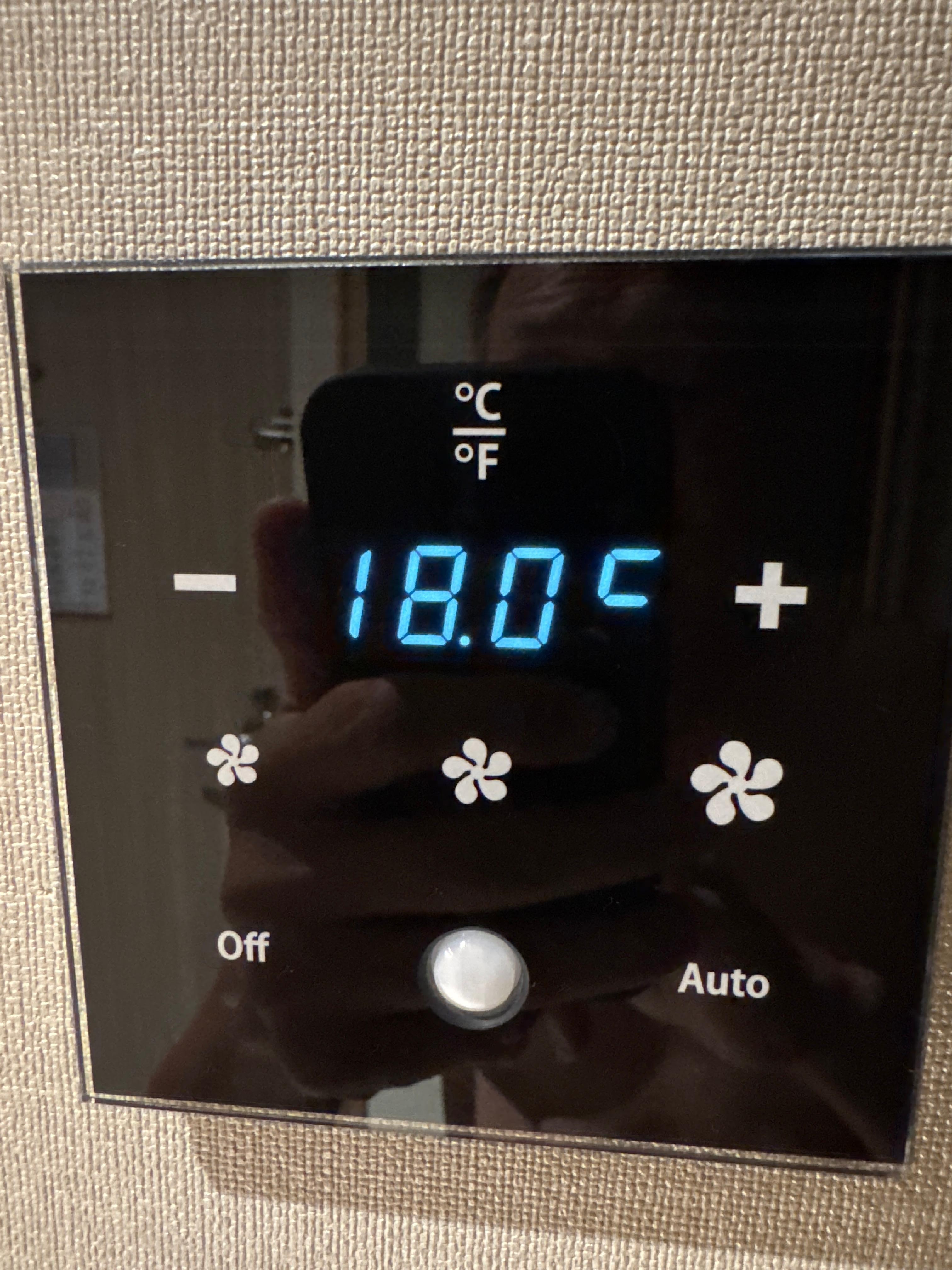 Lowest temp setting.  Room not cool enough.
Shower water is freezing