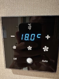 Lowest temp setting. Room not cool enough.
Shower water is freezing