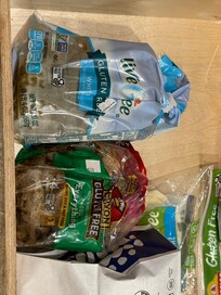 Moldy food in drawer.  Dirty vase in sink & flowers in trash.